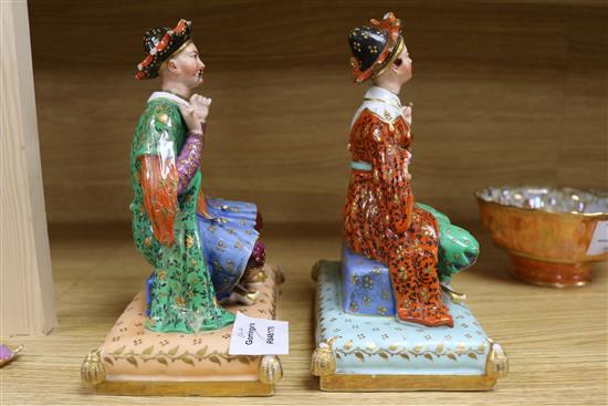 A pair of Paris area figures of a Chinaman and Chinawoman, with detachable heads